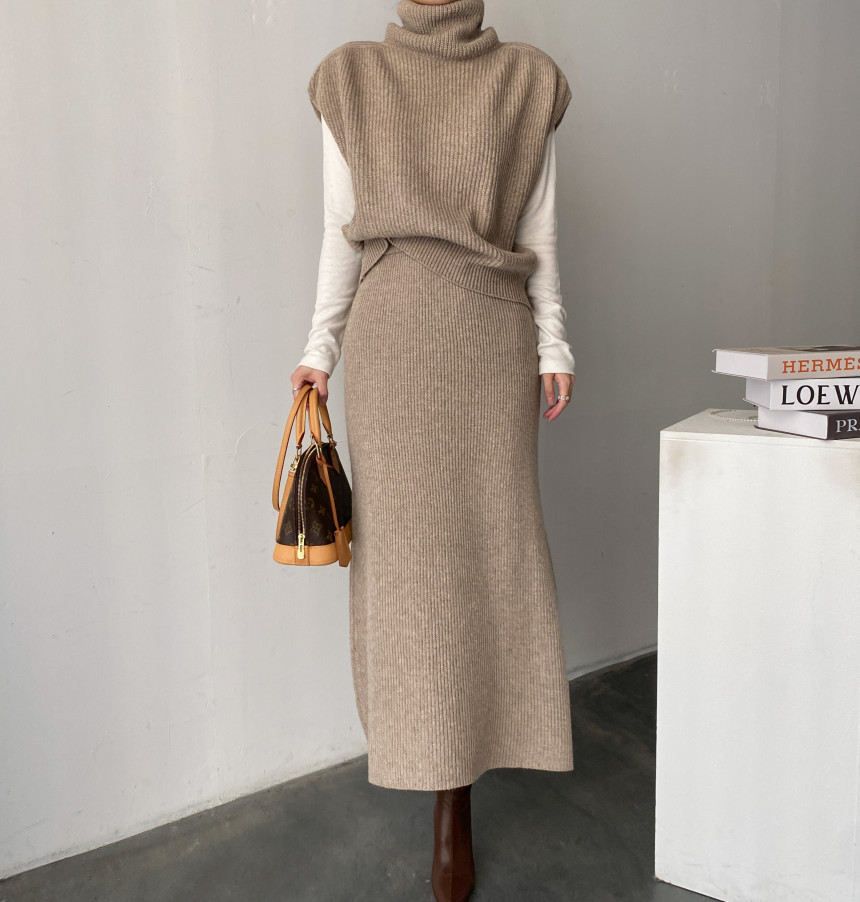09f45d5e31759256b1a0a9b29997a877.jpeg Temperament High -necked Knit Vest Skirt Two -piece Suit - Image 1