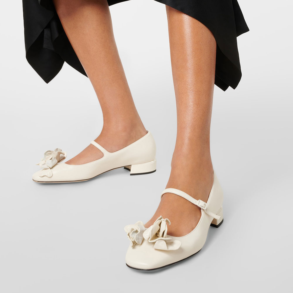 1a1c598552560439584e68a788dfa5cd.jpg Women's White Square Toe Floral Low Block Heel Mary Jane Pumps - Image 1