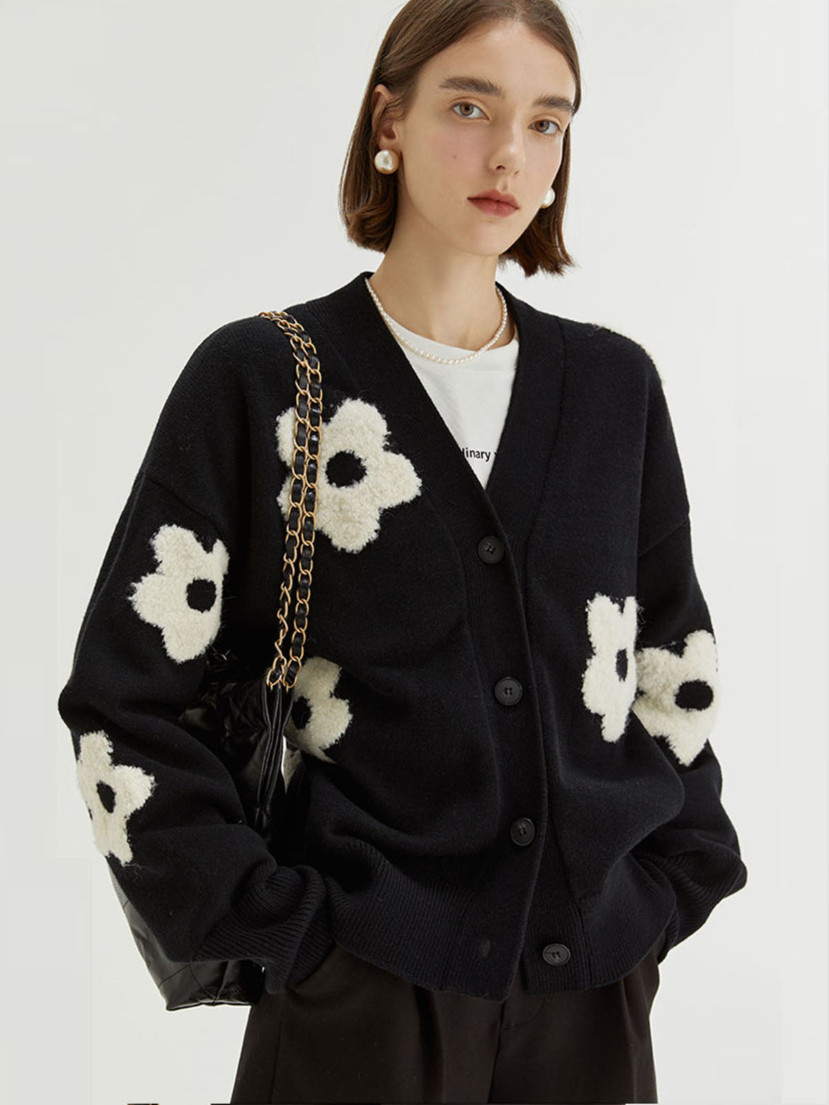 f76bd55fe4749c2bcabc52e4a366da19.jpeg Floral Cardigan - Image 1