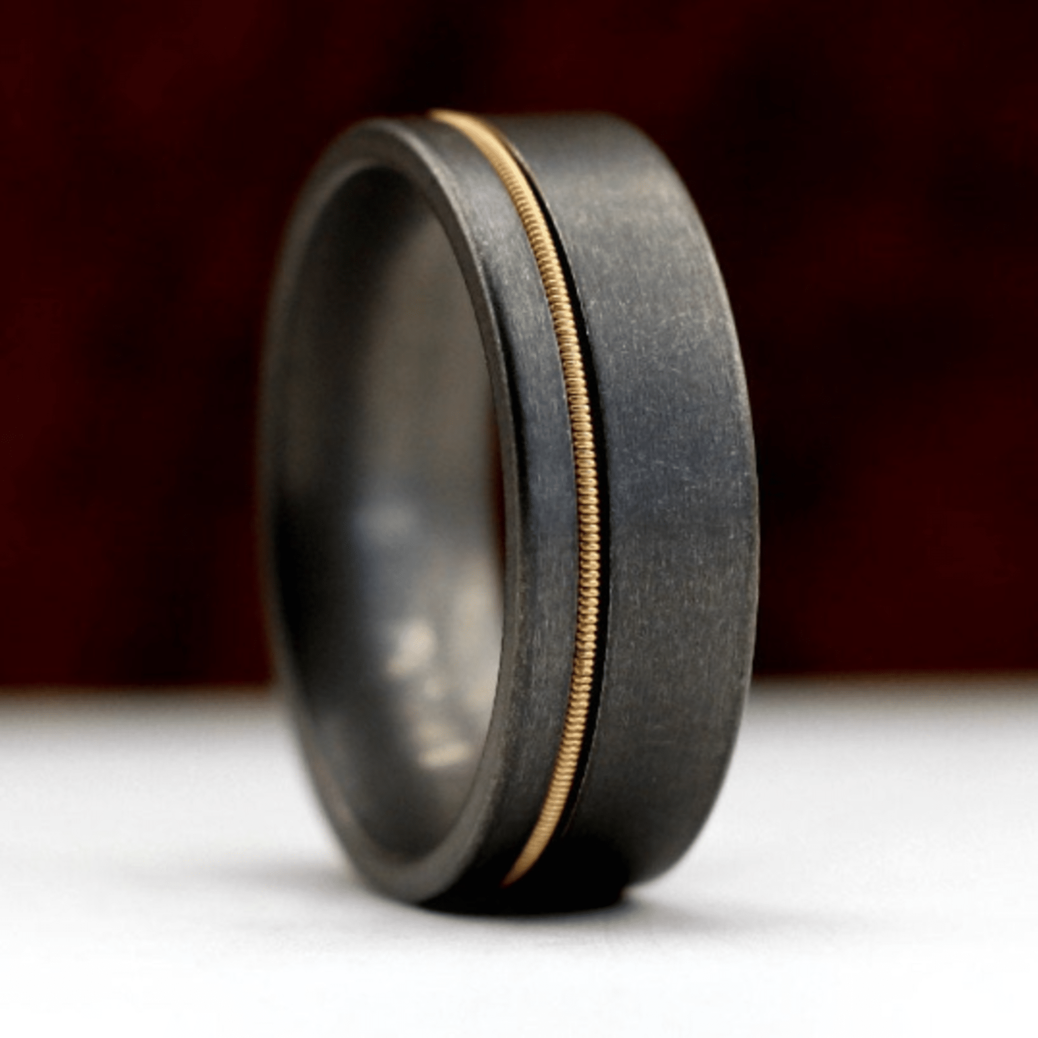 The-Hendrix-8mm-Guitar-String-Wedding-Ring-Thorum-1.png The Hendrix - Image 1
