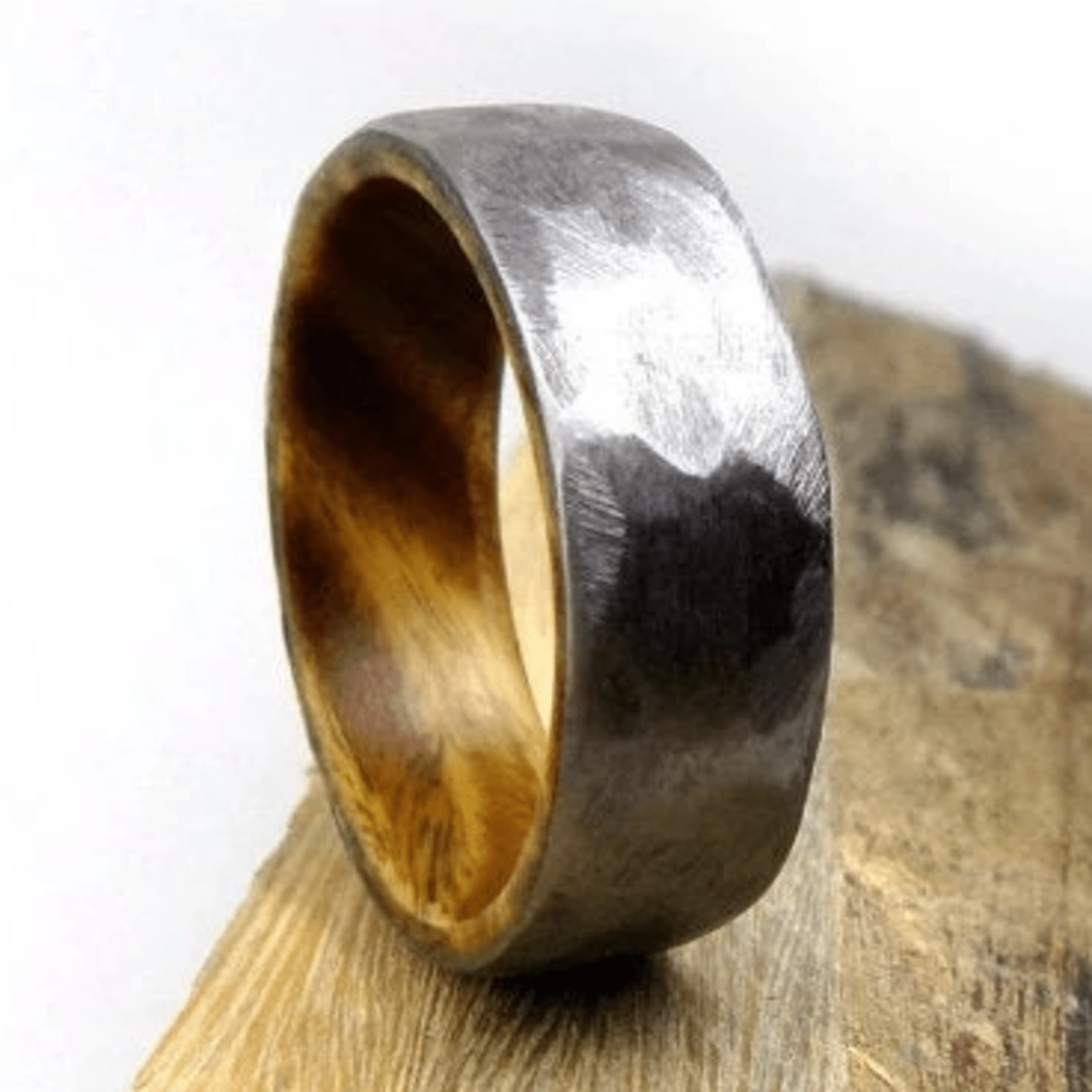 The-Hercules-Mens-Ironwood-Hammered-Wedding-Ring-Thorum-1.png The Hercules - Image 1