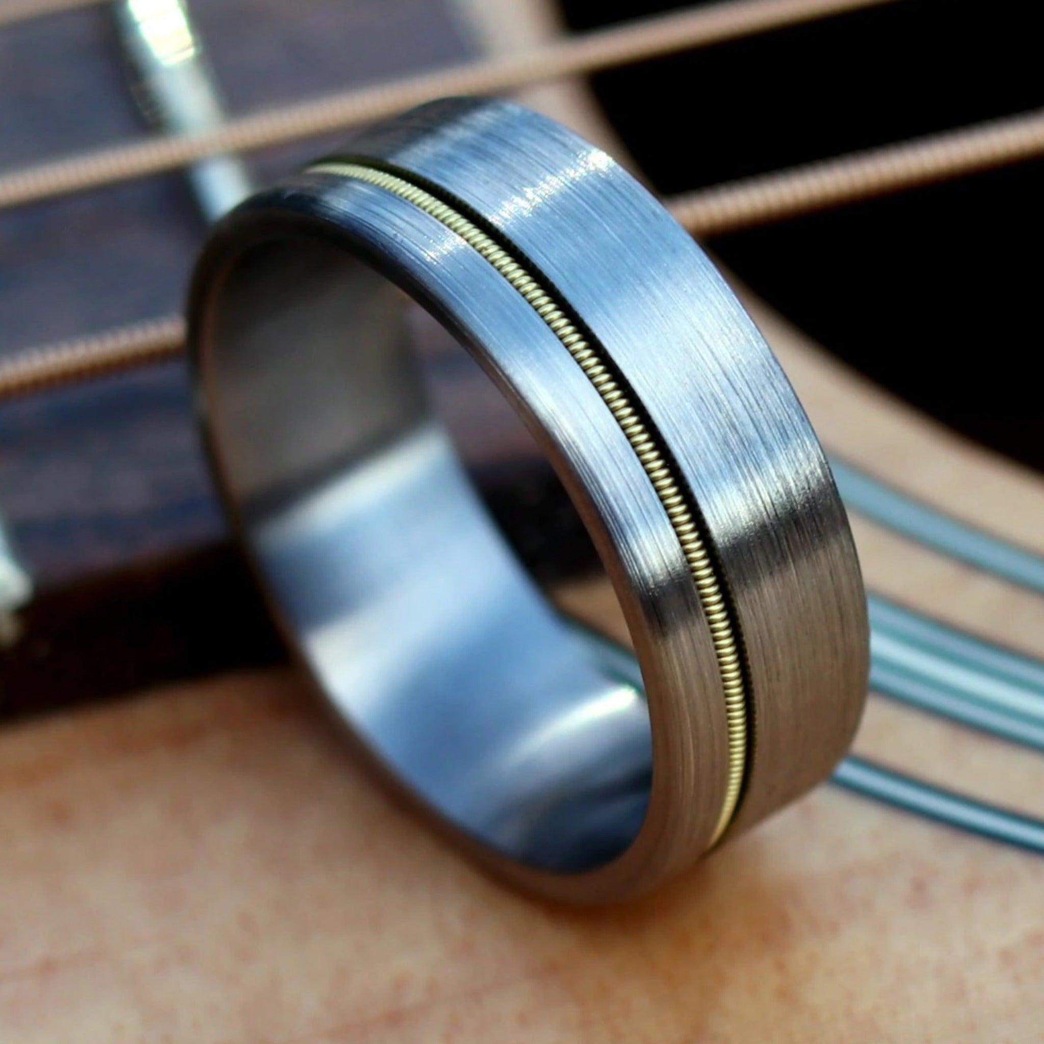 The-Zeppelin-Guitar-String-Wedding-Ring-From-Thorum-4.jpg The Zeppelin - Image 1