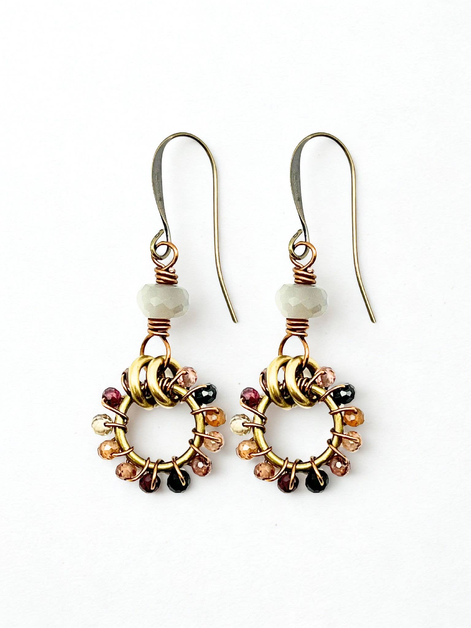 d13afe4b75998addc19333710f5716c0c337b15e98fccaba881dd6d3b8b18a3e.jpg Tundra Sapphire Circle Earrings - Image 1
